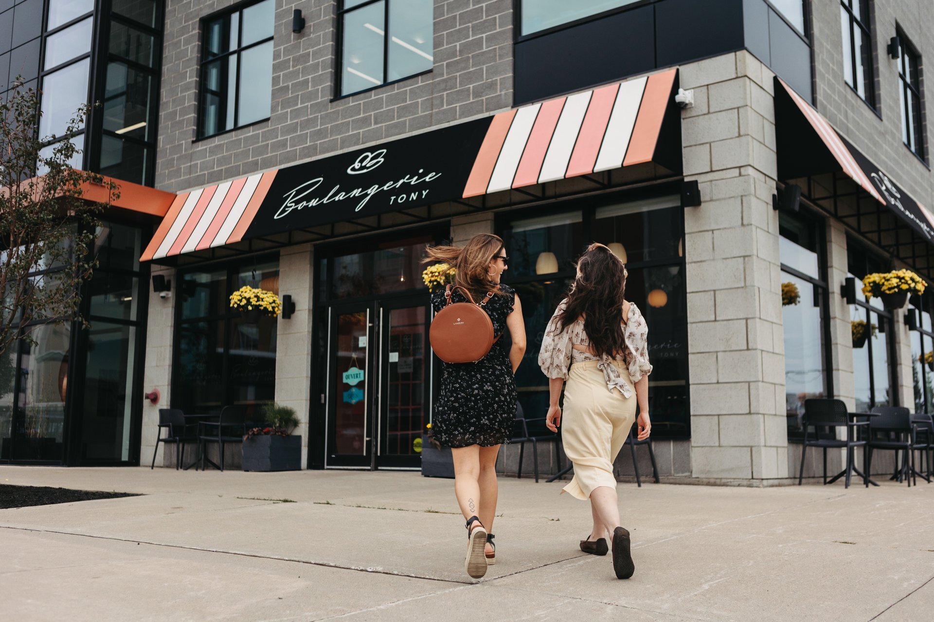 two people going into a restaurant